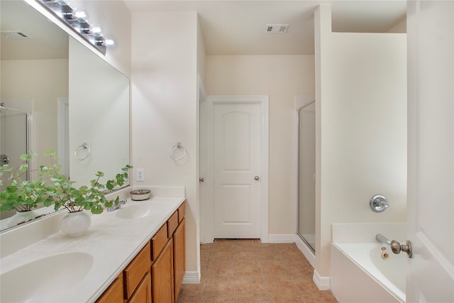 bathroom featuring separate shower and tub and vanity