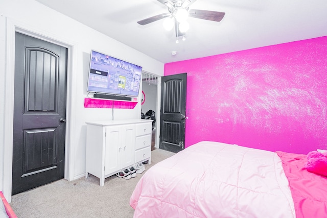 bedroom with ceiling fan and light colored carpet