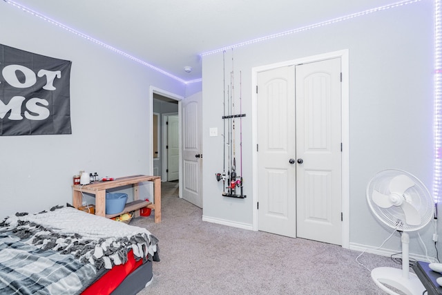 carpeted bedroom with a closet