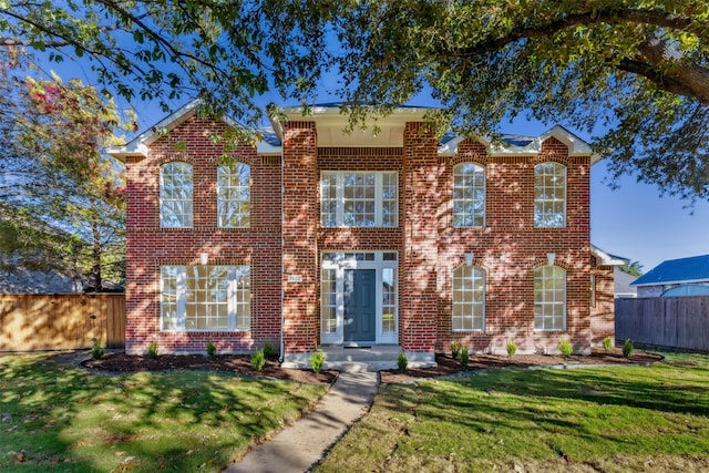 view of front of house featuring a front lawn