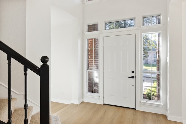 entryway featuring a wealth of natural light and light wood-type flooring