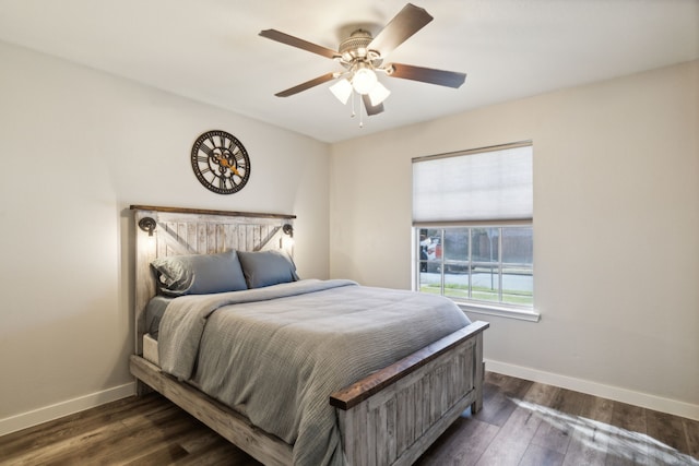 bedroom featuring ceiling fan and dark hardwood / wood-style flooring