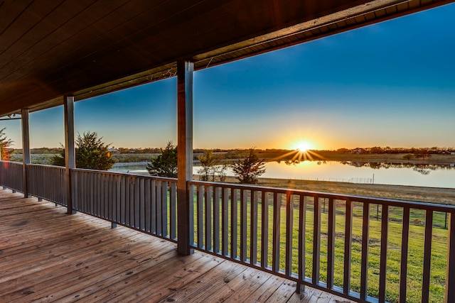 deck at dusk with a water view