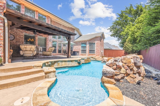 view of swimming pool featuring a patio