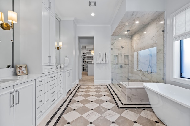 bathroom with vanity, separate shower and tub, and ornamental molding