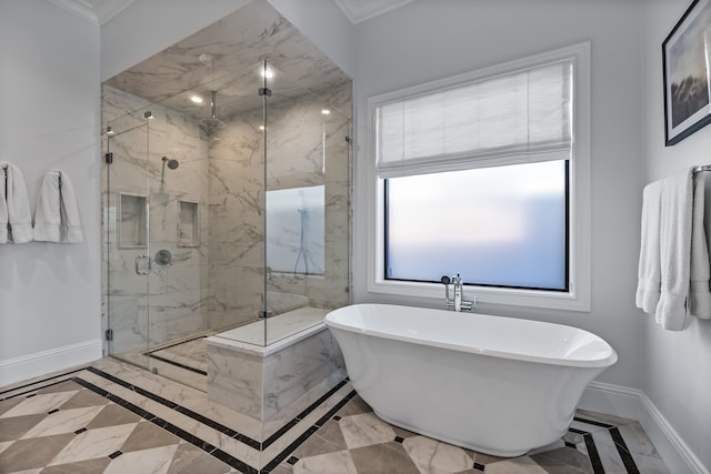 bathroom with shower with separate bathtub and ornamental molding