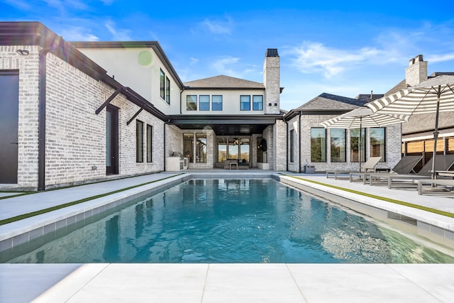 view of pool with a patio