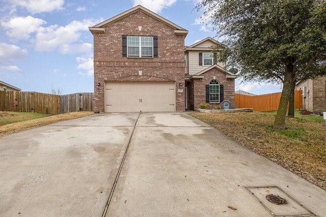 front facade with a garage