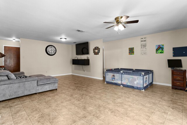 living room with ceiling fan