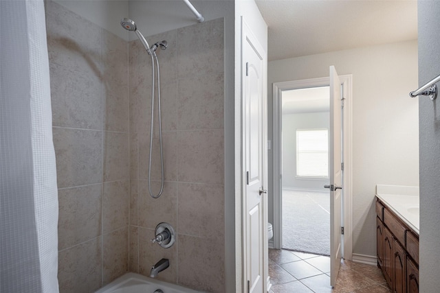 full bathroom with toilet, shower / tub combo, vanity, and tile patterned floors