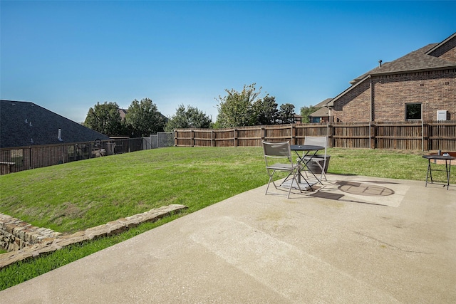 view of yard with a patio area