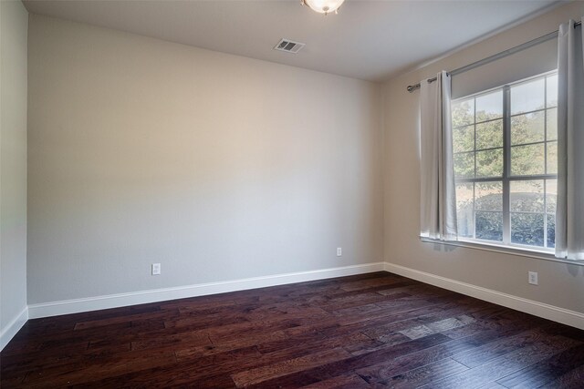 4844 Exposition Way, Fort Worth, TX 76244 - unfurnished room with dark wood-type flooring, healthy amount of natural light, and baseboards