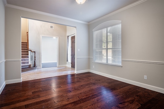 unfurnished room with wood-type flooring and crown molding