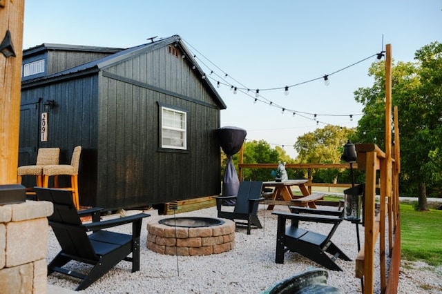 view of patio / terrace with a fire pit