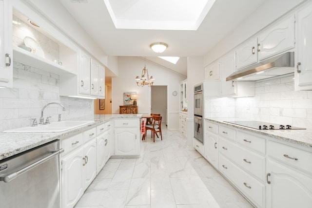 kitchen with marble finish floor, a notable chandelier, stainless steel appliances, a sink, and under cabinet range hood