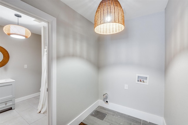 washroom with washer hookup, a notable chandelier, gas dryer hookup, laundry area, and baseboards