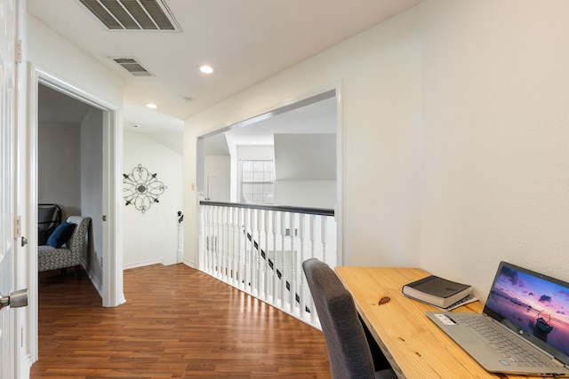 office space with hardwood / wood-style flooring