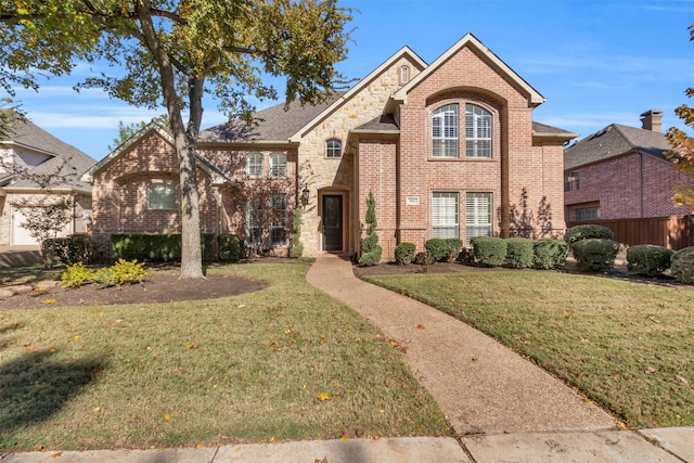 view of property with a front lawn