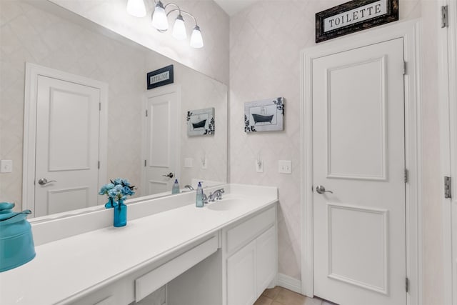 bathroom featuring tile patterned floors and vanity