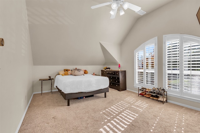 carpeted bedroom featuring ceiling fan and lofted ceiling