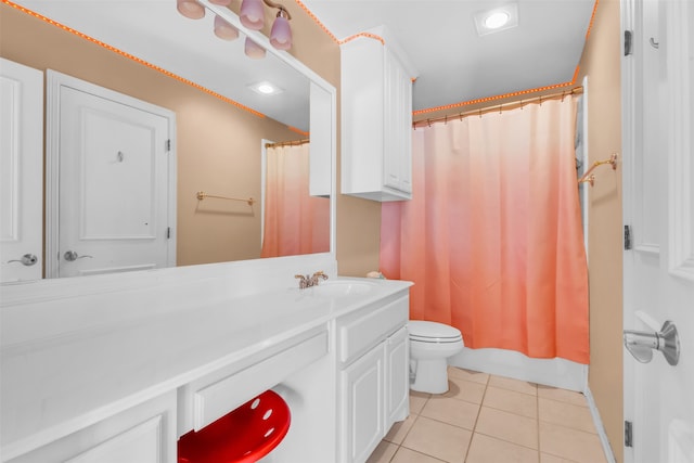 bedroom featuring hardwood / wood-style flooring, ceiling fan, crown molding, and a tray ceiling