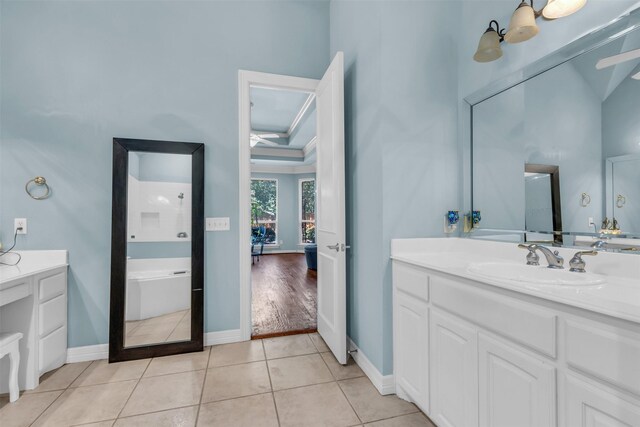 bathroom with vanity, high vaulted ceiling, tile patterned floors, and ceiling fan