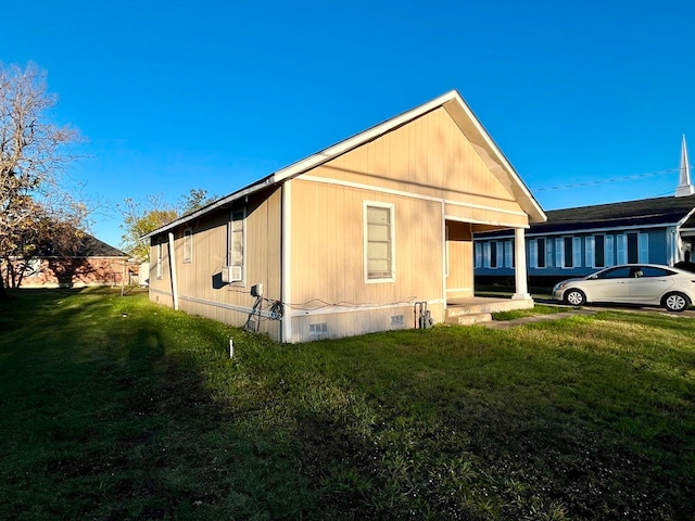 view of home's exterior featuring a lawn