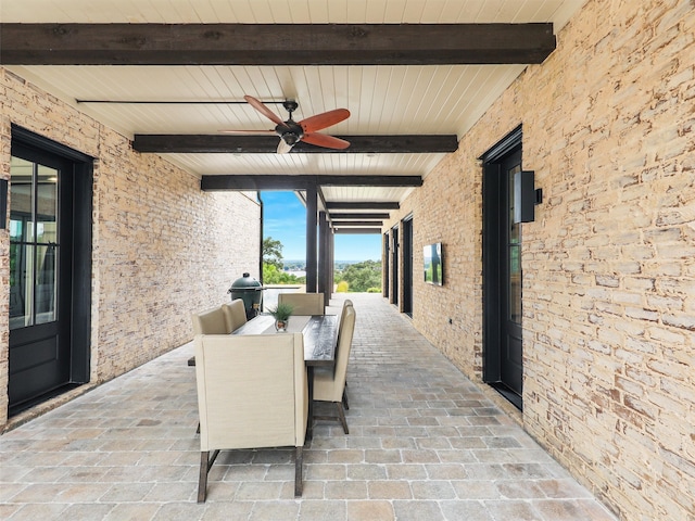 view of patio / terrace with ceiling fan and an outdoor hangout area