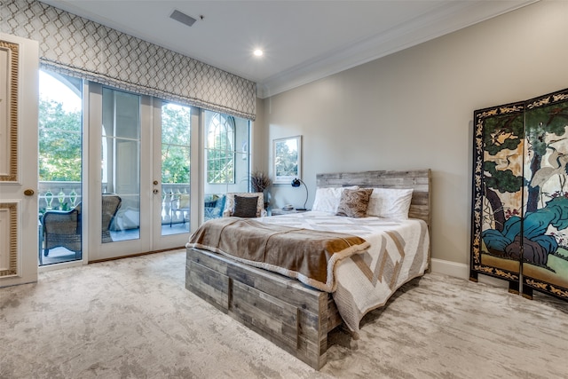 carpeted bedroom with access to exterior, french doors, and crown molding