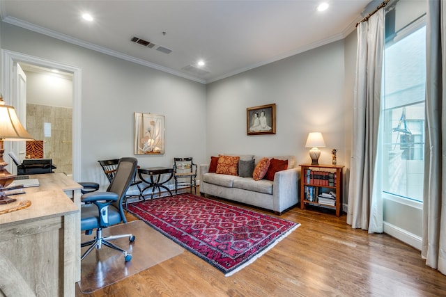 office space featuring hardwood / wood-style floors and ornamental molding