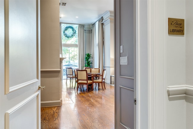 dining area with hardwood / wood-style floors