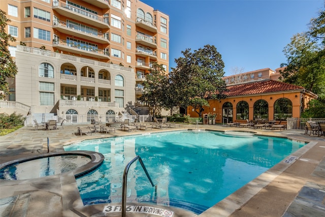 view of swimming pool featuring a patio