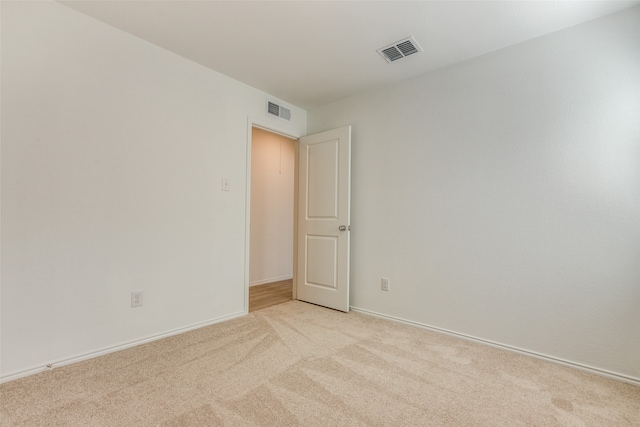 empty room with light carpet