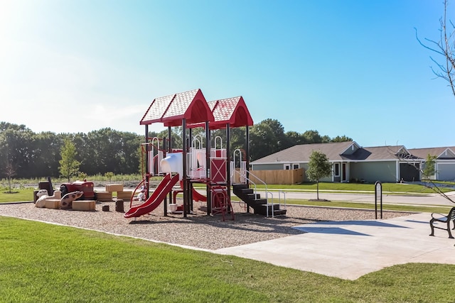 view of playground featuring a lawn