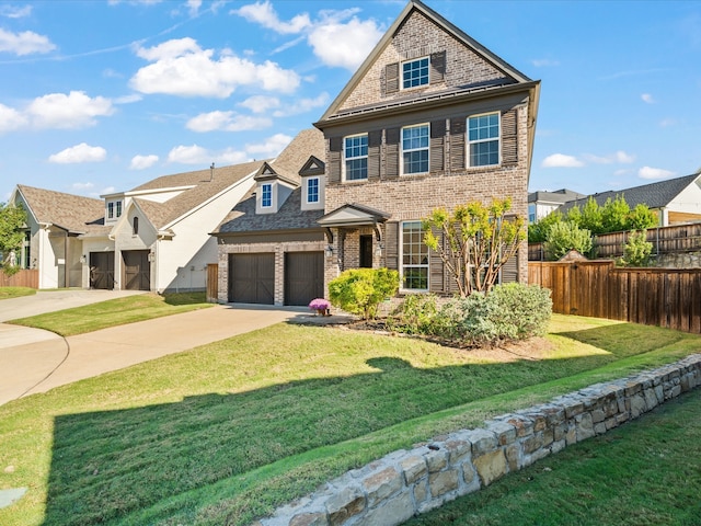 craftsman-style home with a garage and a front yard