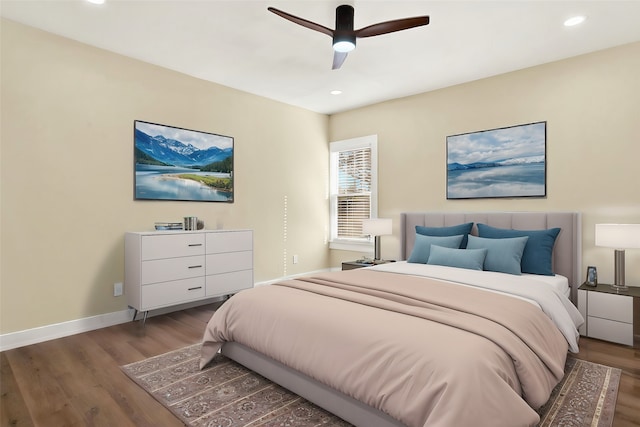 bedroom featuring hardwood / wood-style floors and ceiling fan