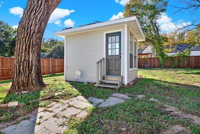 view of front of home with a porch and a front yard