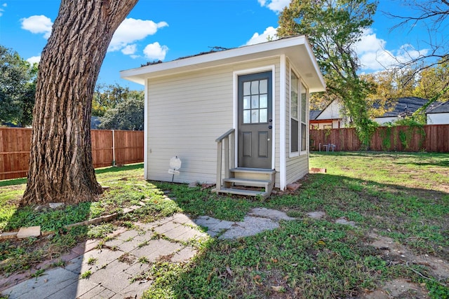 view of outdoor structure featuring a yard