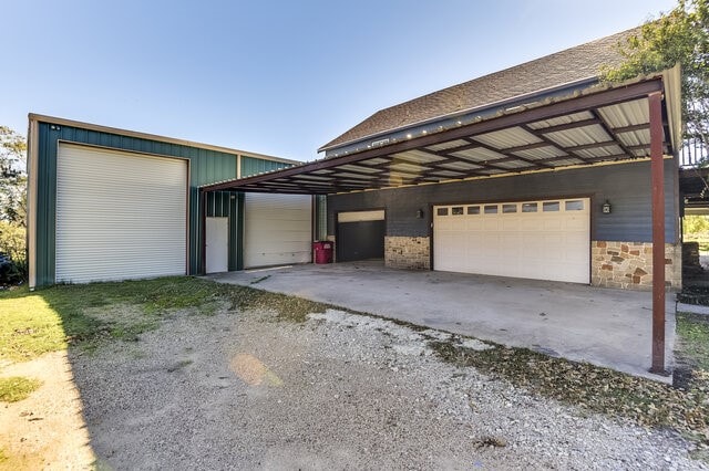 garage with a carport