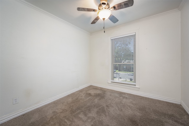 empty room with crown molding, carpet, and ceiling fan