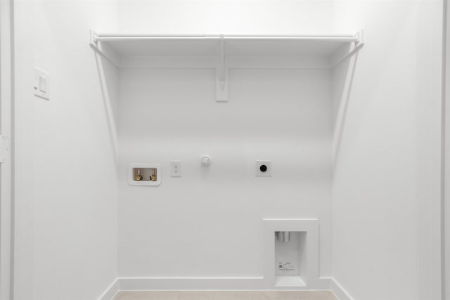 clothes washing area featuring baseboards, hookup for an electric dryer, gas dryer hookup, and washer hookup