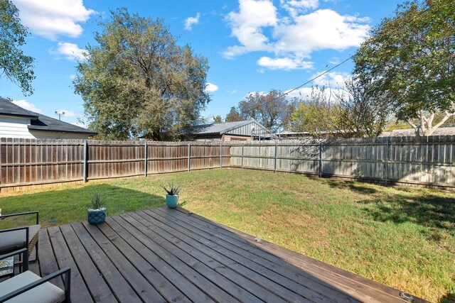 view of yard with a deck