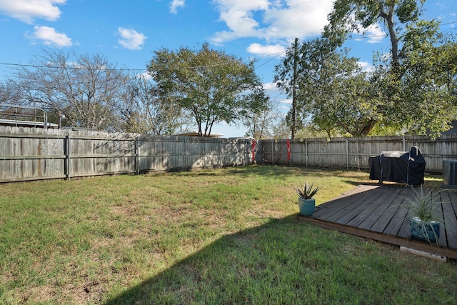 view of yard with a deck