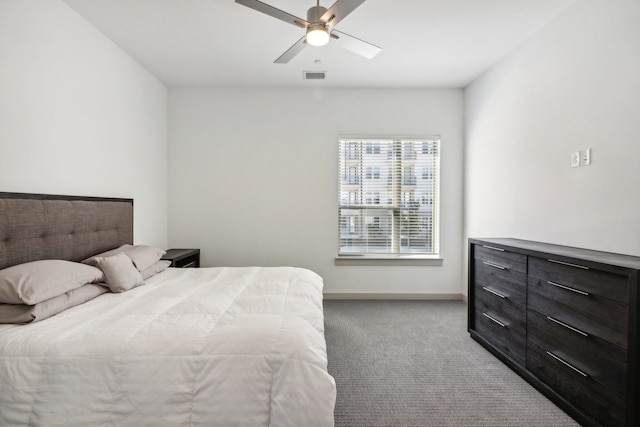 bedroom featuring ceiling fan and light colored carpet