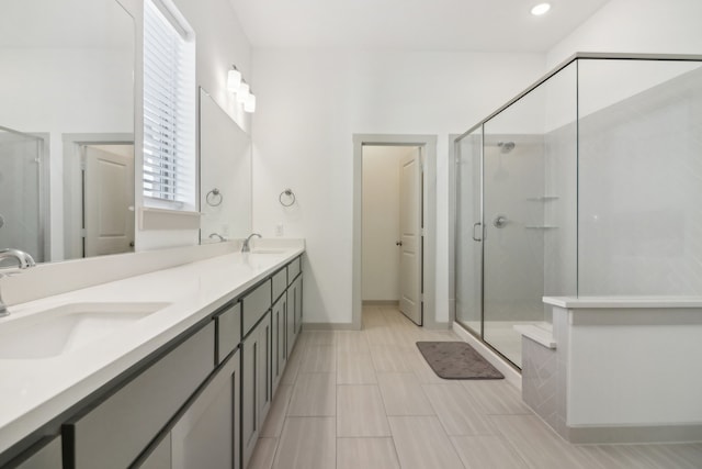 bathroom featuring vanity and walk in shower