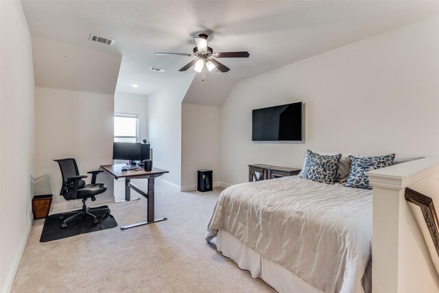 carpeted bedroom featuring ceiling fan and vaulted ceiling