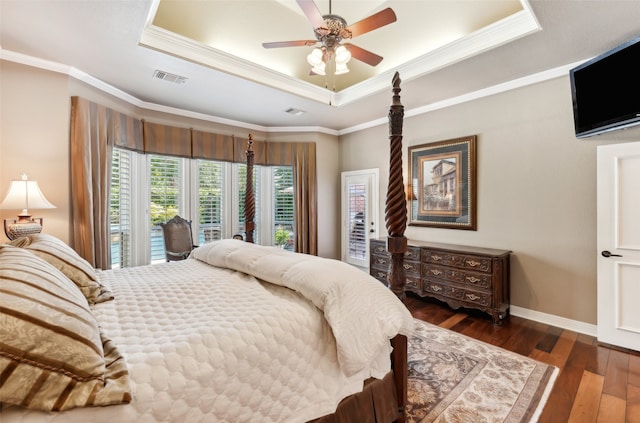 bedroom featuring access to outside, a raised ceiling, ceiling fan, and dark hardwood / wood-style floors