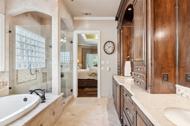 bathroom featuring vanity, separate shower and tub, and crown molding