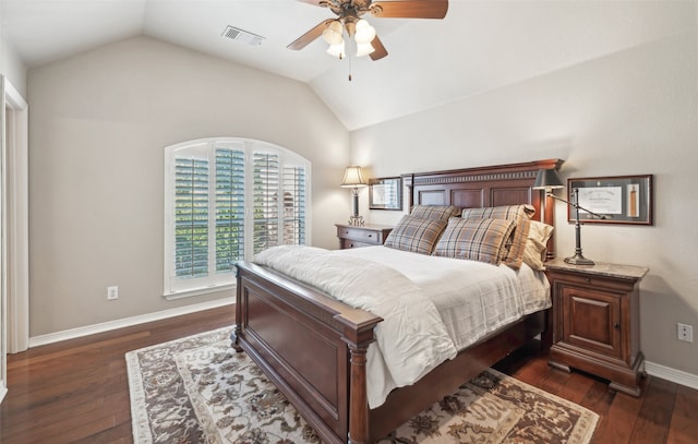 bedroom with ceiling fan, dark hardwood / wood-style flooring, and lofted ceiling