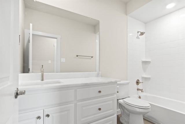 full bath with shower / bathing tub combination, vanity, and toilet